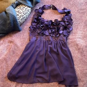 Cute party halter top. Great with black pants or skirt!